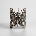 Cherub Ring in 925 sterling silver, front view, hand-sculpted wings around the center.