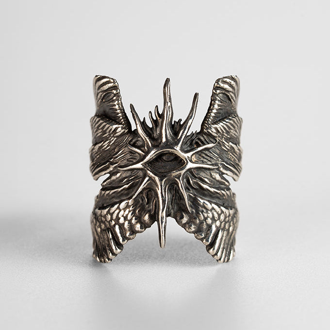 Cherub Ring in 925 sterling silver, front view, hand-sculpted wings around the center.