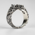 Angled view of the "Babel" oxidized silver ring, highlighting the intricate handcrafted structural details by Seba Makes.