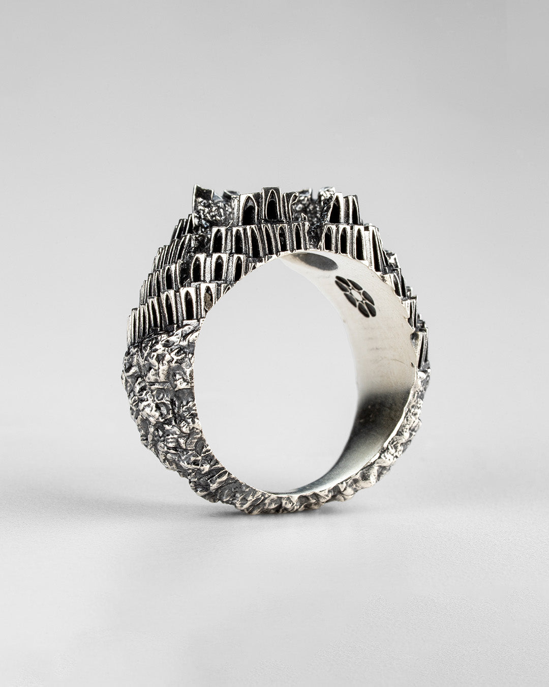 Side view of Babel Ring, 925 sterling silver handmade ring with brutalist architectural layers by Sebamakes.