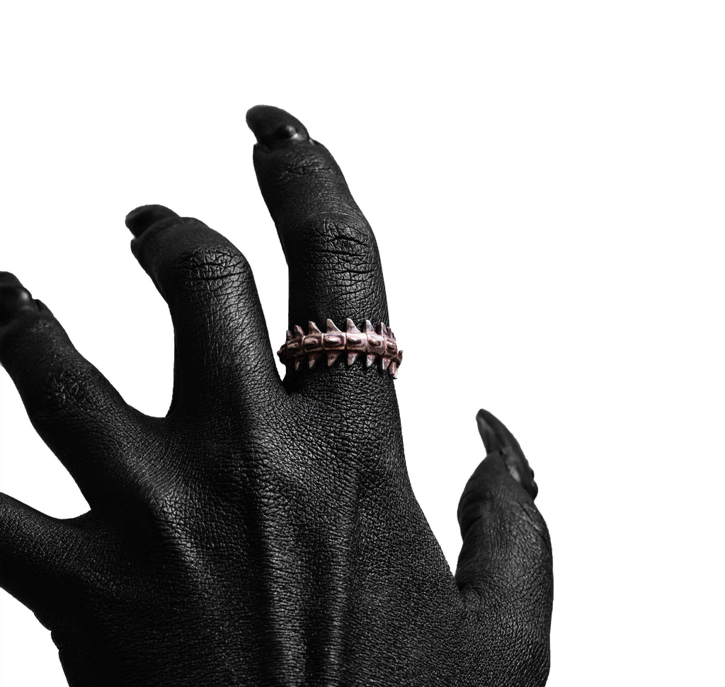 Close-up worn view of the Backbone Ring by Sebamakes, handcrafted sterling silver ring inspired by spine anatomy and sculptural forms.