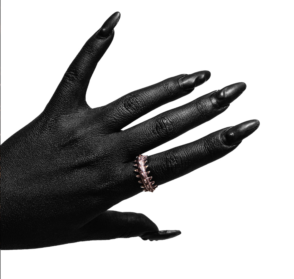 Worn view of the Backbone Ring in sterling silver by Sebamakes, anatomical spine-inspired ring with bold handcrafted design.