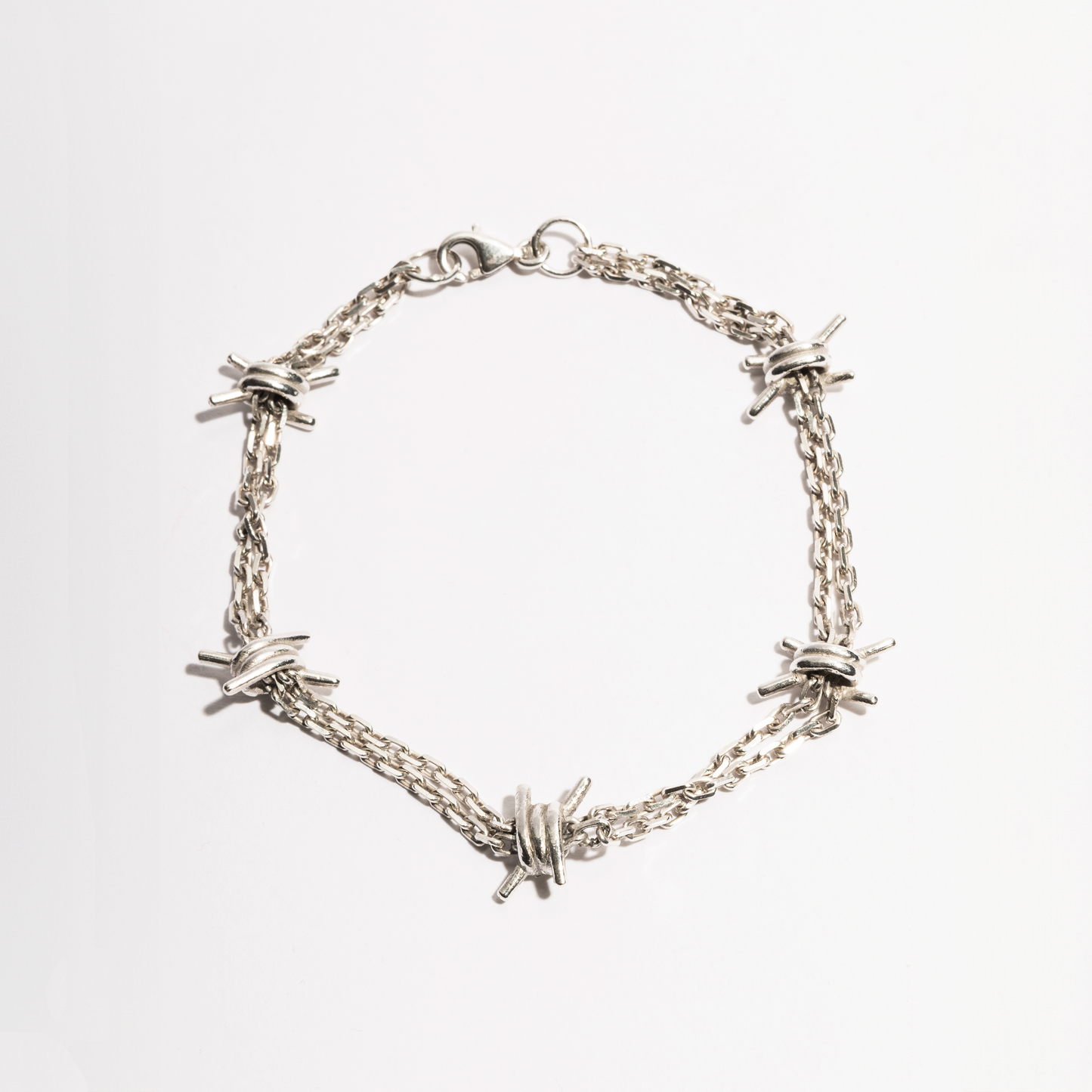 Barbwire Bracelet by Sebamakes, handcrafted sterling silver bracelet inspired by barbed wire, featuring detailed spikes and an industrial minimal design, made in Italy.