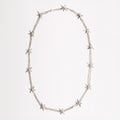 Full view of the Barbwire Necklace by Sebamakes, handcrafted sterling silver necklace inspired by barbed wire design, made in Italy.