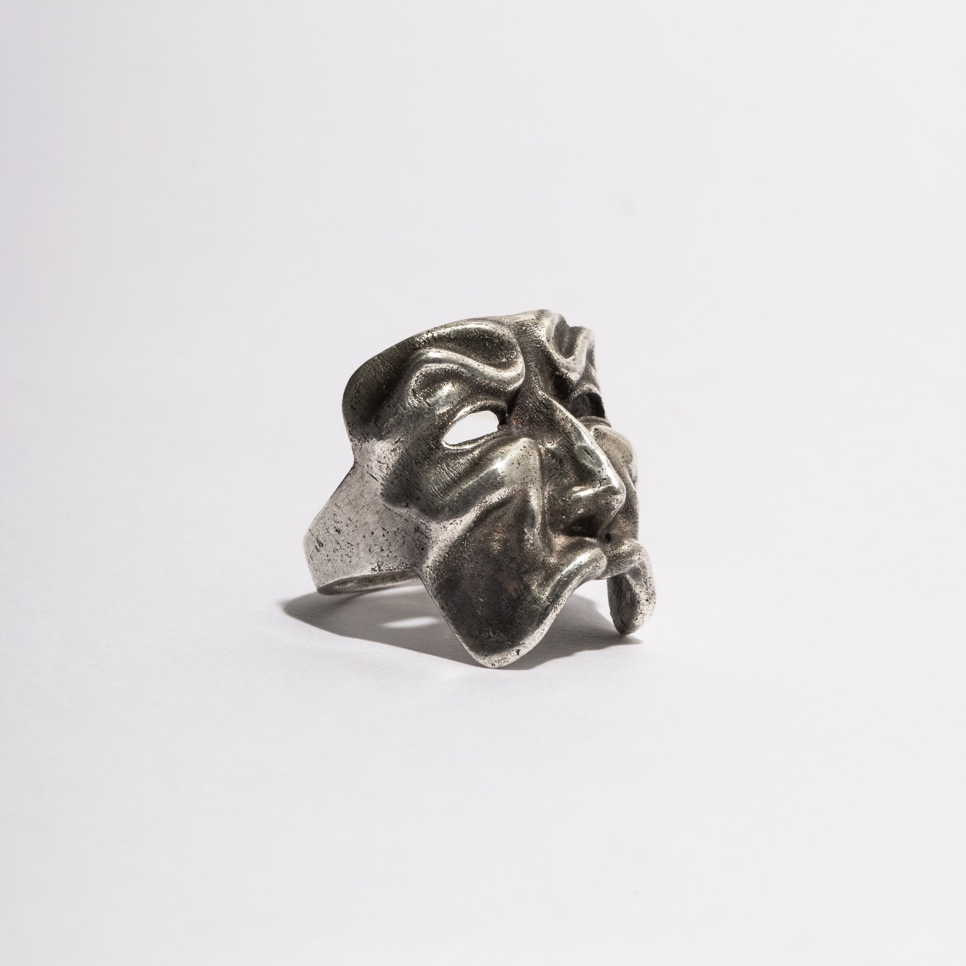 Side view of the Bernardon Ring in sterling silver, handcrafted Venetian mask jewelry by Sebamakes with sculptural gothic design.