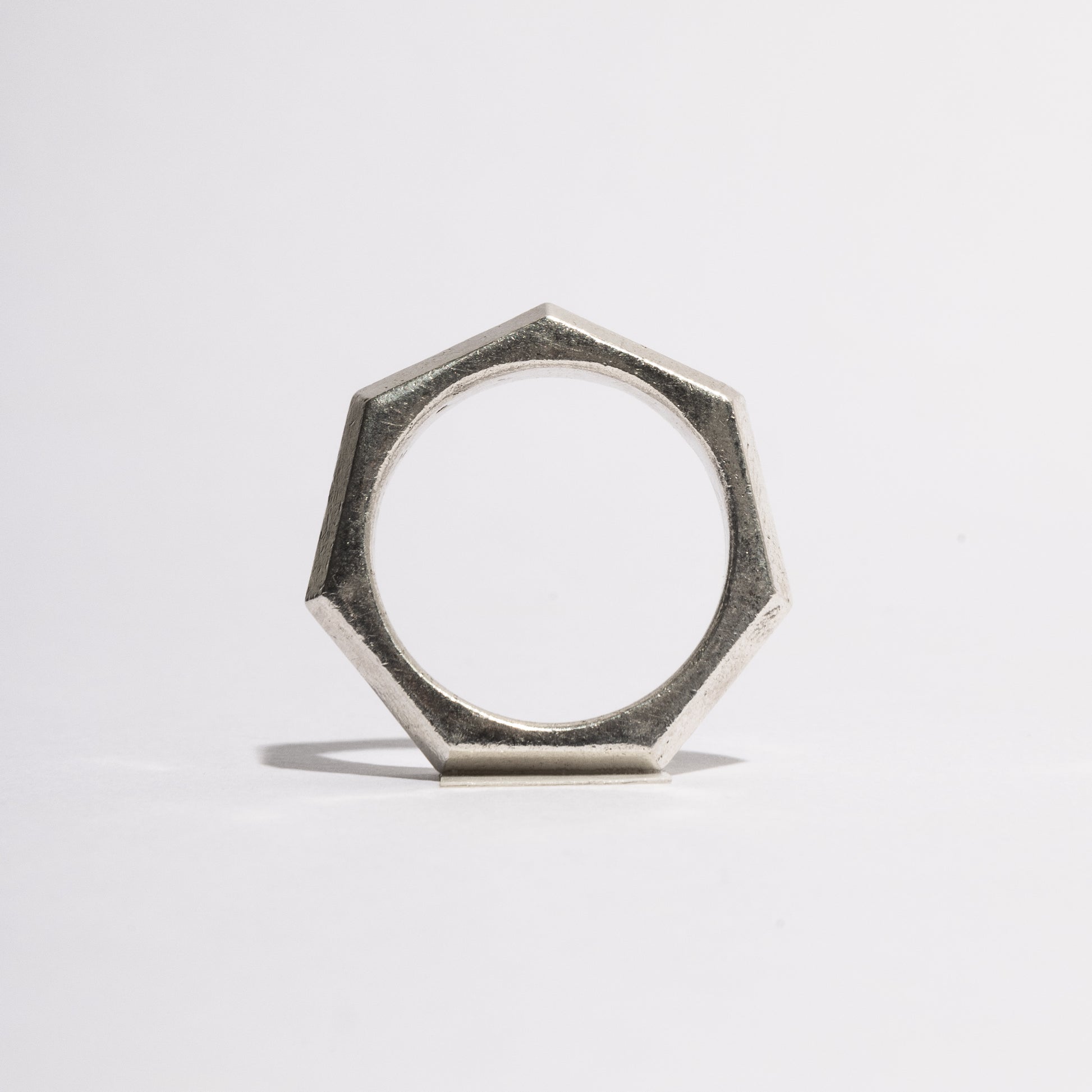 Side view of the Bolt Silver Ring by Sebamakes, sterling silver ring featuring a bold hexagonal profile and minimal industrial style, handcrafted in Italy.