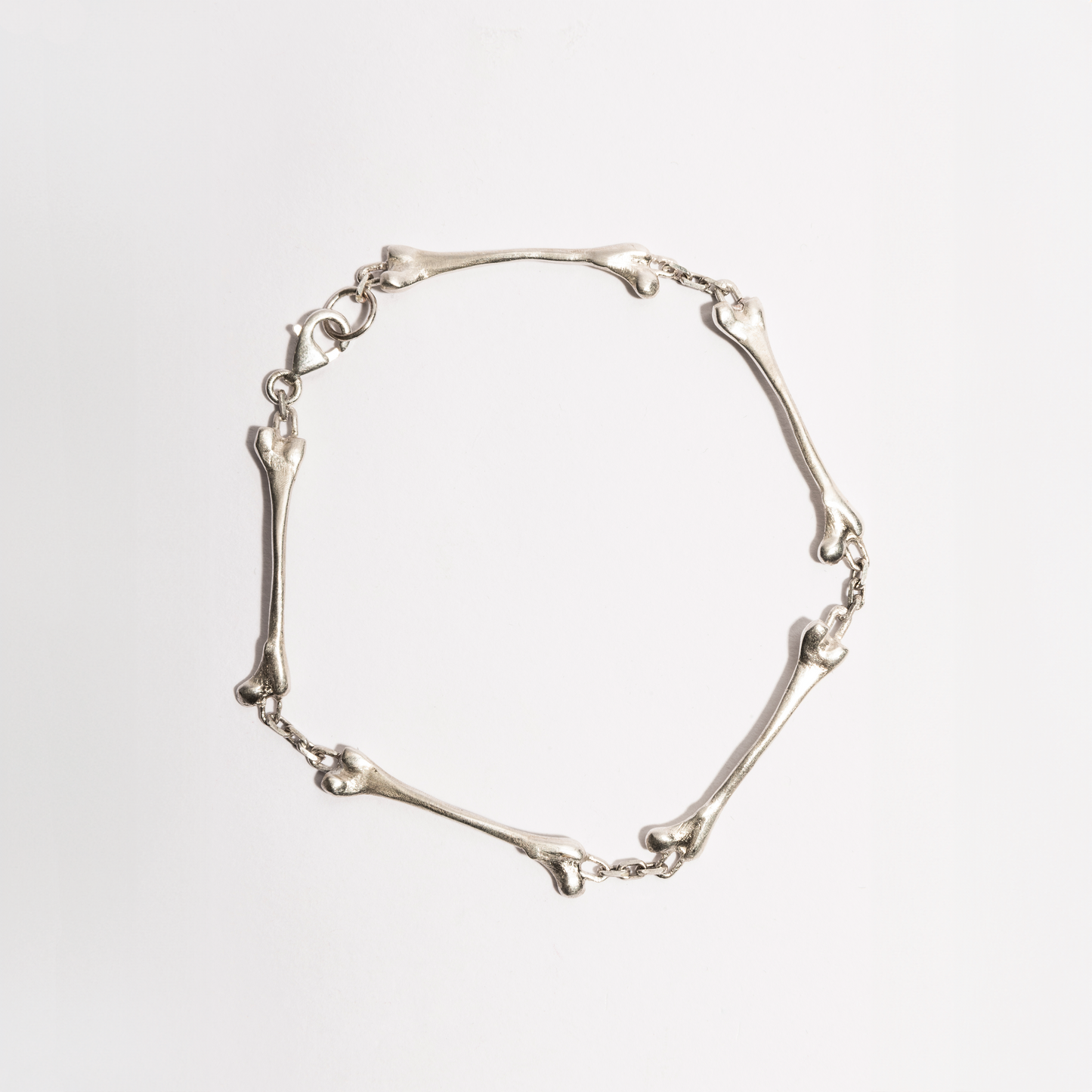 Bone Bracelet by Sebamakes, handcrafted sterling silver bracelet inspired by human anatomy and skeletal structure, made in Italy.