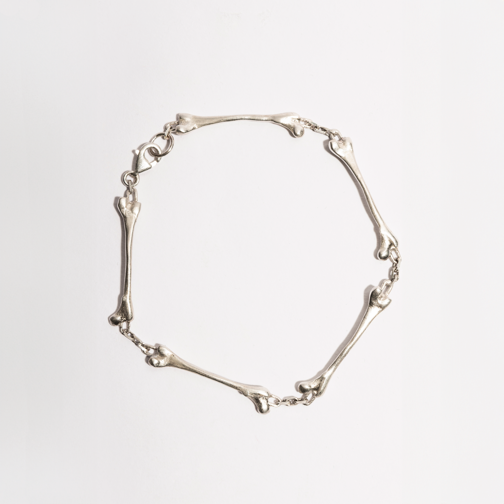 Bone Bracelet by Sebamakes, handcrafted sterling silver bracelet inspired by human anatomy and skeletal structure, made in Italy.