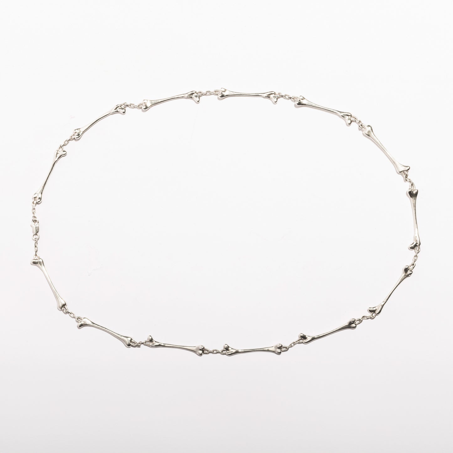 Bone Necklace by Sebamakes, handcrafted sterling silver necklace made of sculptural bone-shaped links, gothic design handcrafted in Italy.