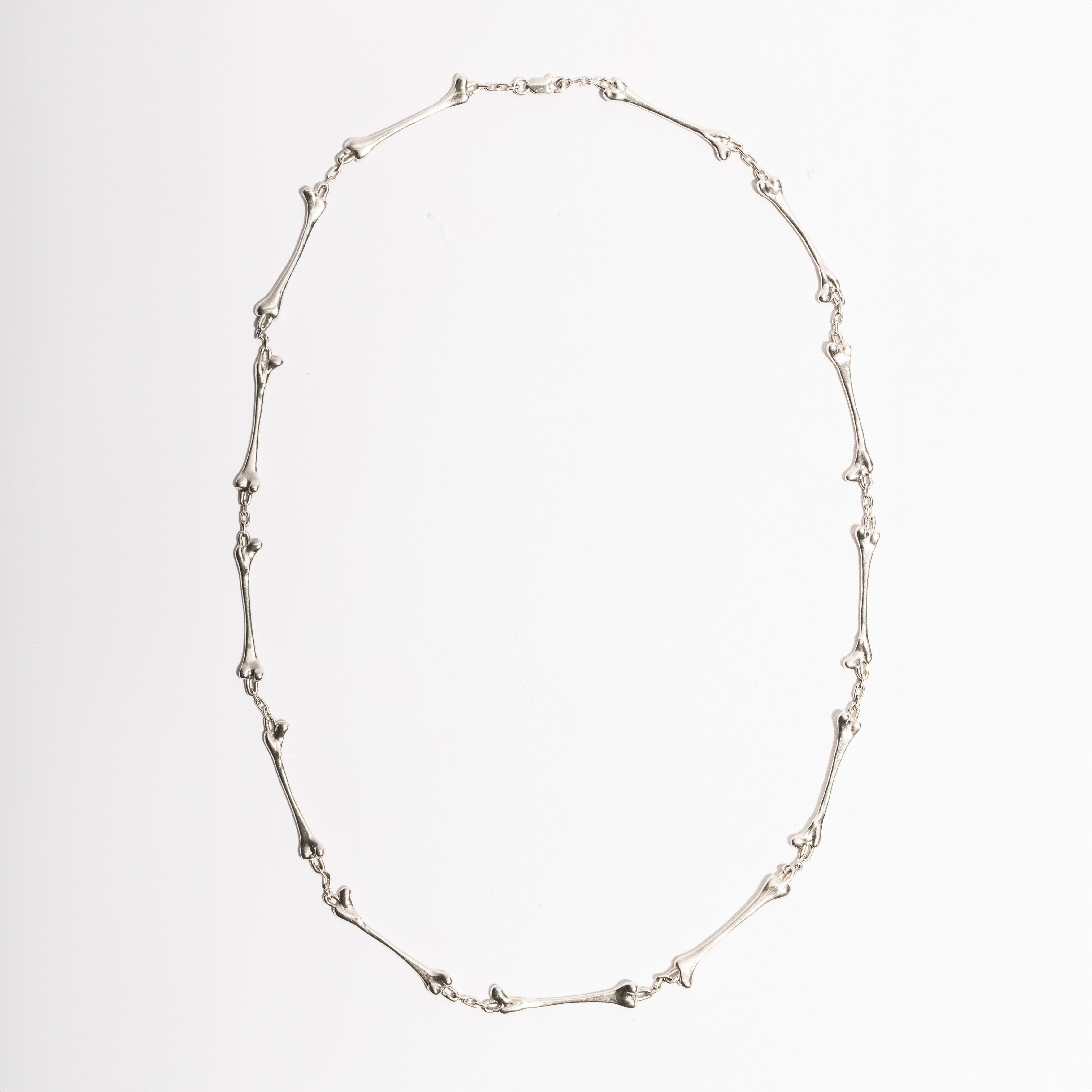 Bone Necklace by Sebamakes, handcrafted sterling silver necklace made of sculptural bone-shaped links, gothic design handcrafted in Italy.