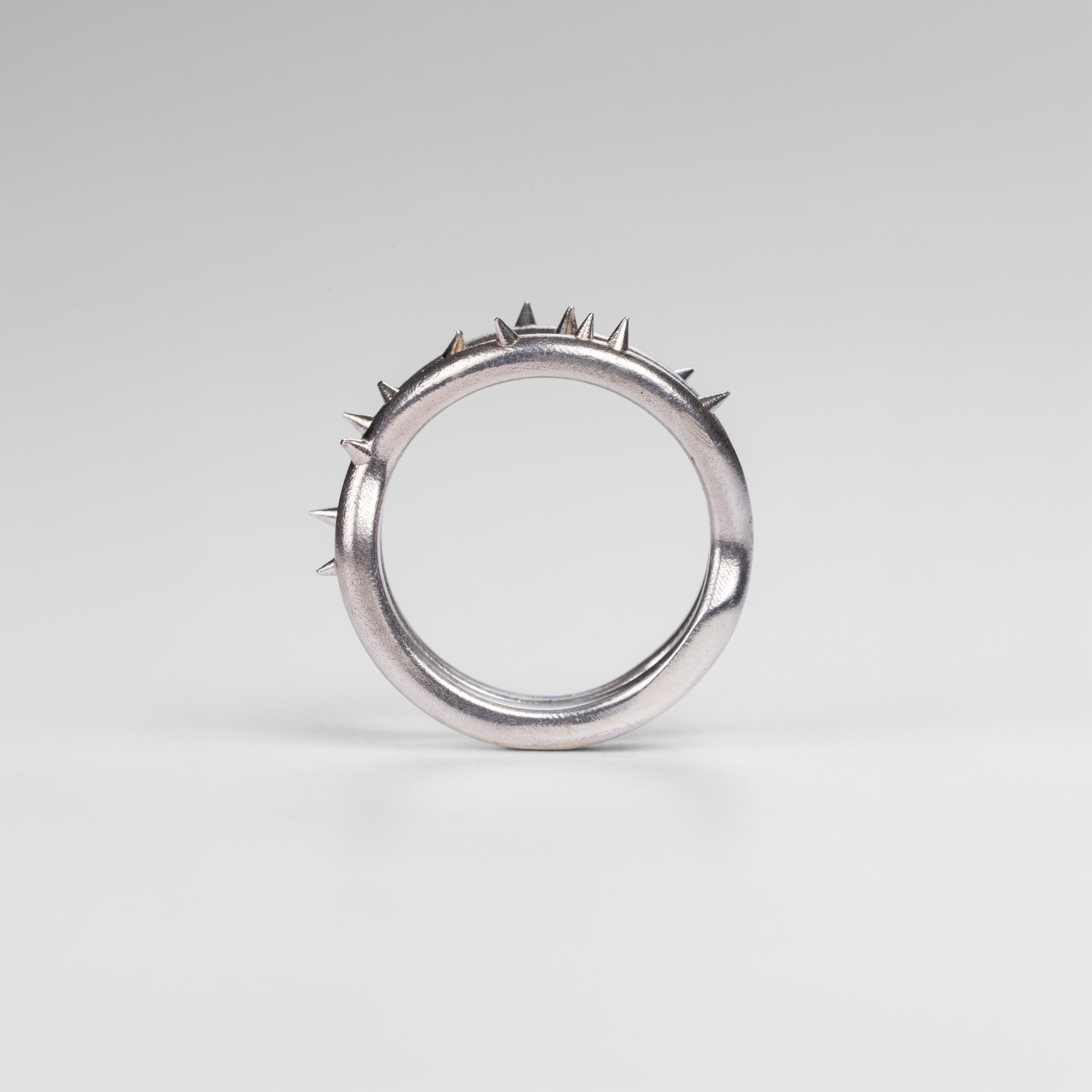 Main upright view of the "Brambles" silver ring by Seba Makes, featuring a handcrafted design sculpted like a branch with individual thorns.