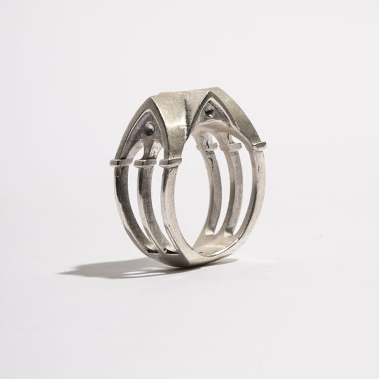Angled view of the Cathedral Ring by Sebamakes, handcrafted sterling silver ring inspired by gothic architecture and sculptural design, made in Italy.