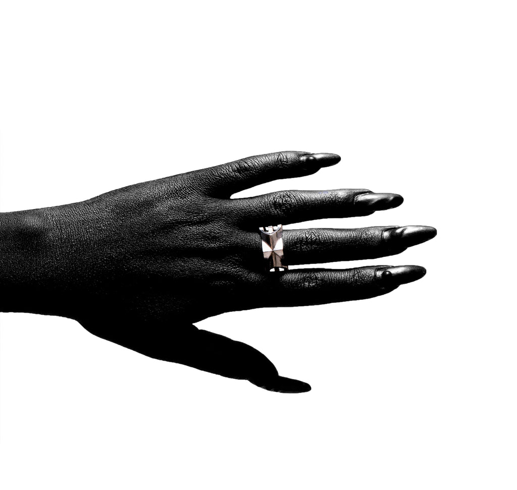 Styling view of the Cathedral Ring by Sebamakes, handcrafted sterling silver ring with gothic architectural structure and raw minimal aesthetic.