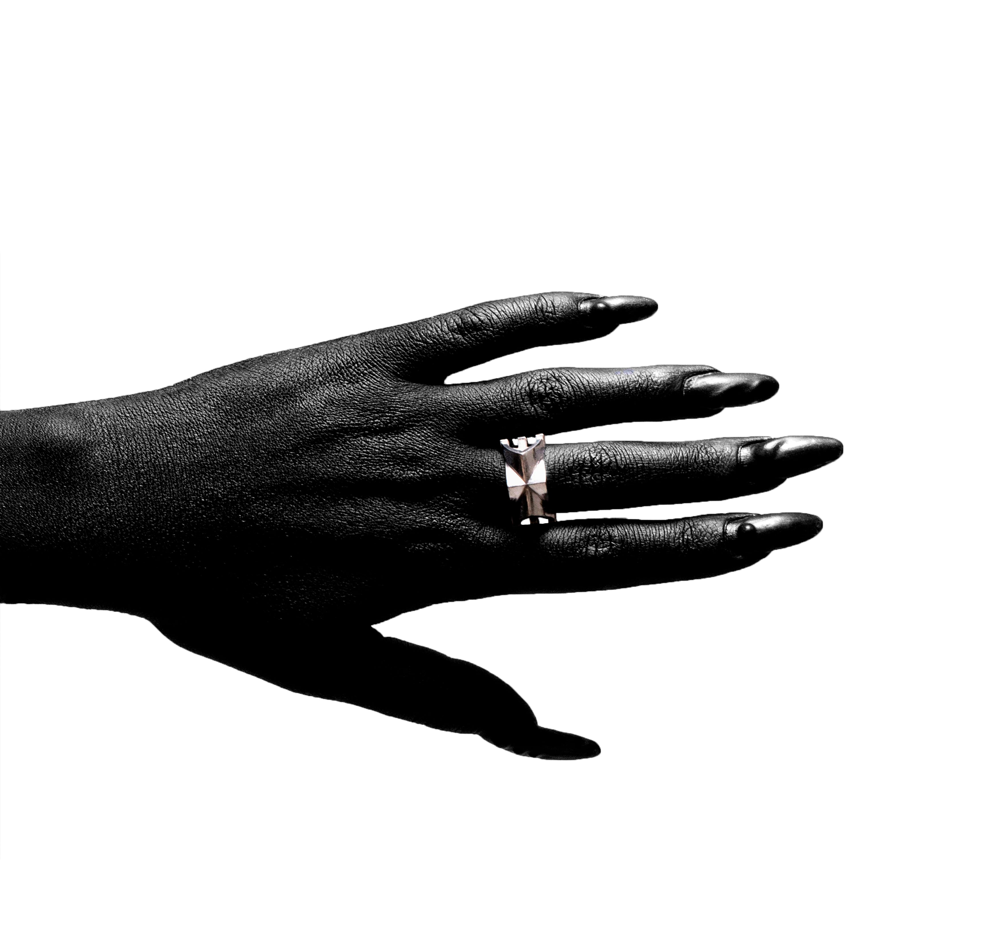 Styling view of the Cathedral Ring by Sebamakes, handcrafted sterling silver ring with gothic architectural structure and raw minimal aesthetic.