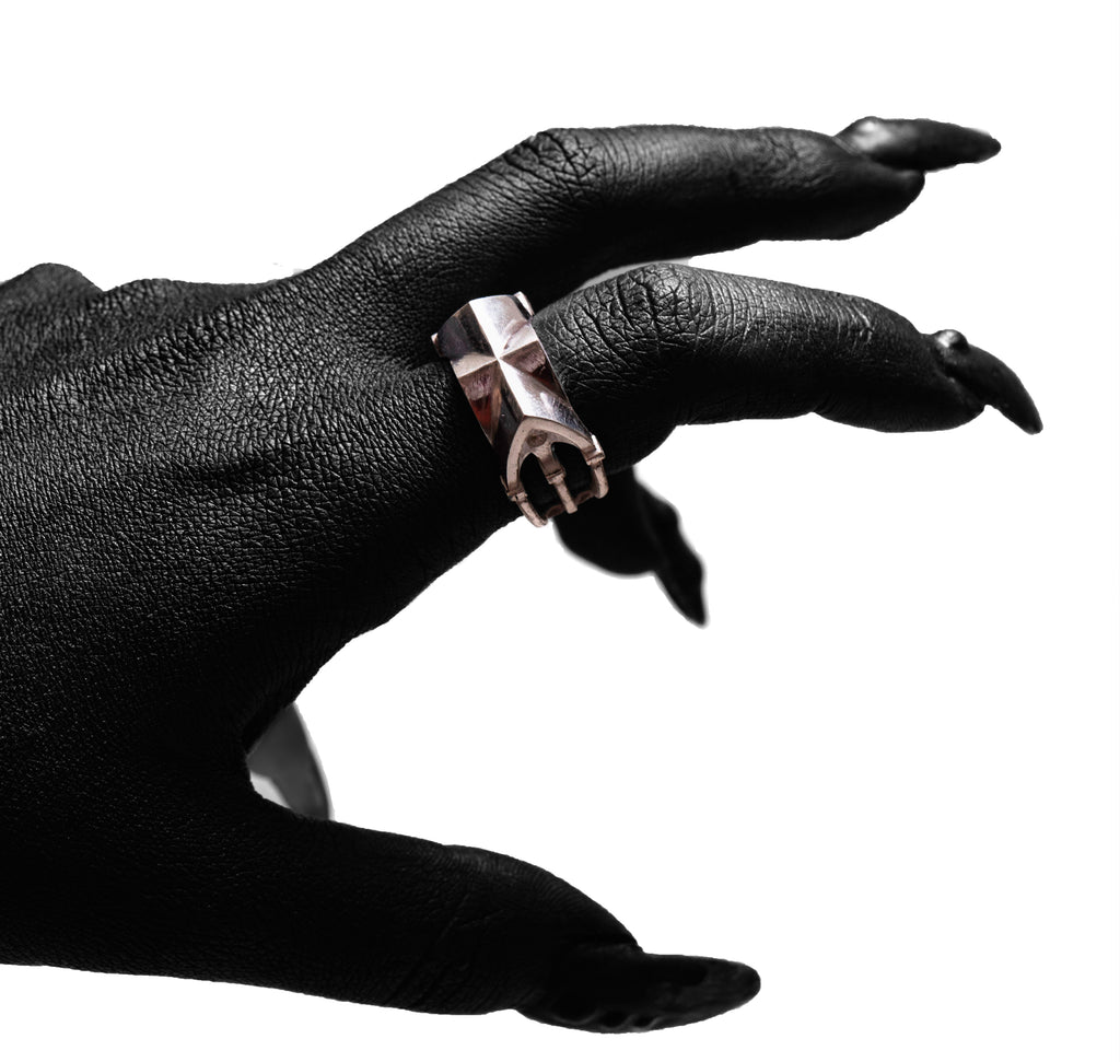Close-up worn view of the Cathedral Ring by Sebamakes, handcrafted sterling silver ring inspired by gothic cathedrals and sculptural minimalism.