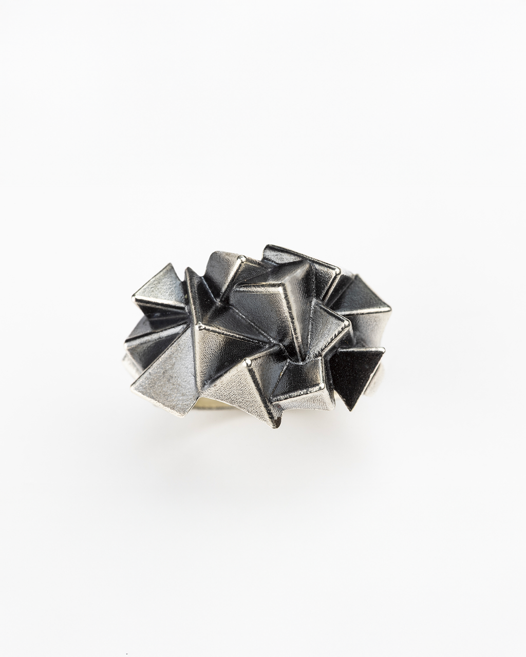 Top view of the multi-layered architectural structure of the handmade 925 silver Cestia Ring.