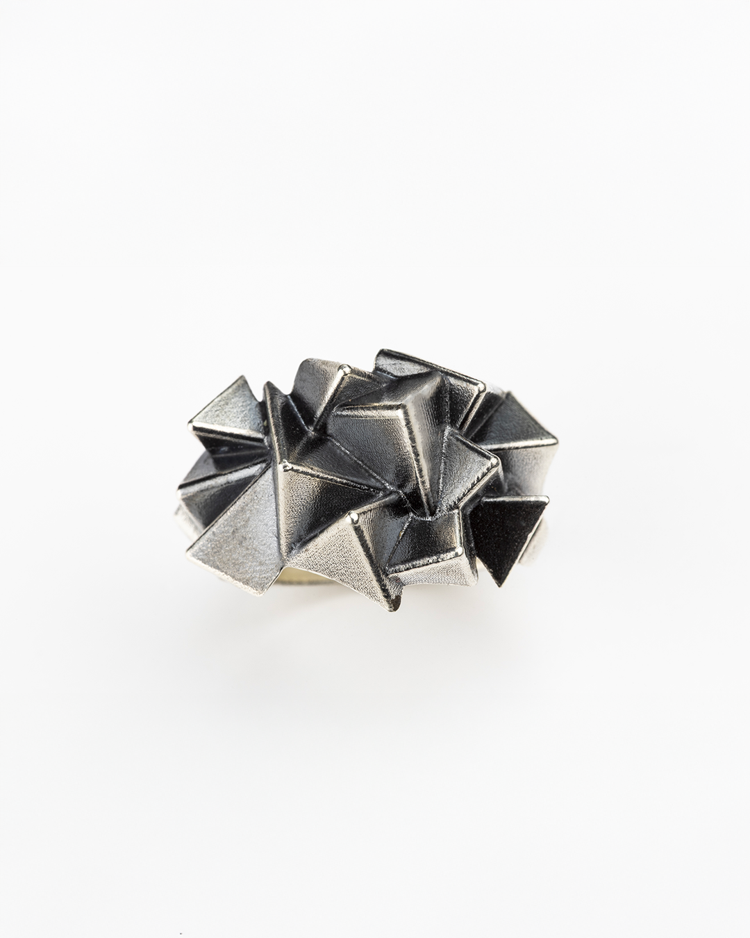 Top view of the multi-layered architectural structure of the handmade 925 silver Cestia Ring.