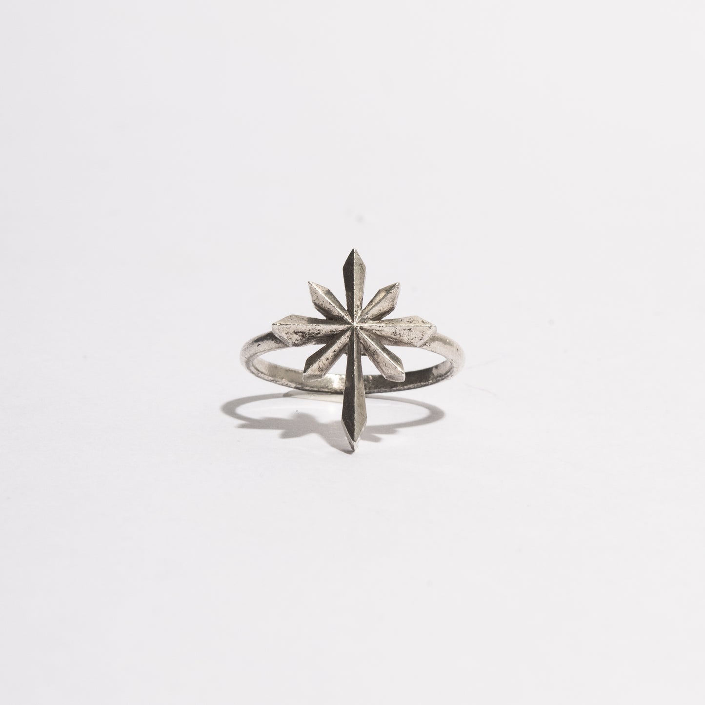 Comet Ring by Sebamakes, handcrafted sterling silver ring inspired by a comet shape, featuring a directional geometric design made in Italy.