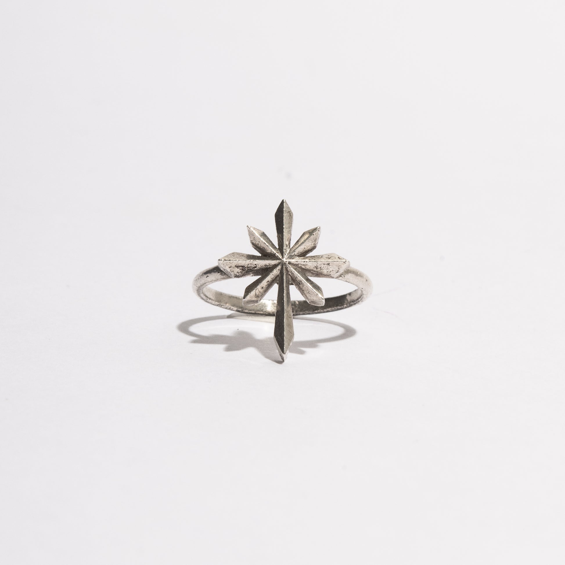 Comet Ring by Sebamakes, handcrafted sterling silver ring inspired by a comet shape, featuring a directional geometric design made in Italy.