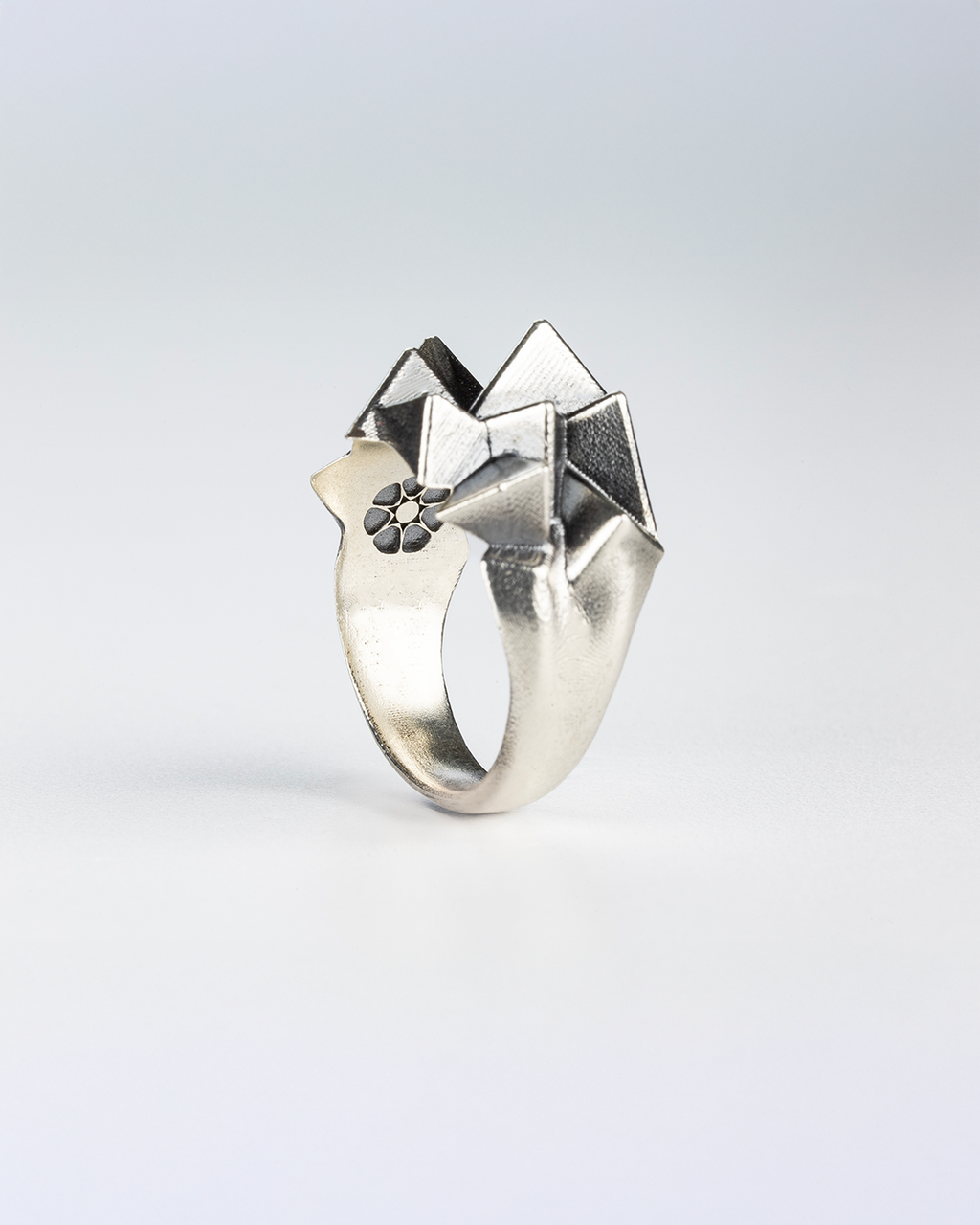 Close-up detail of the hand-burnished finish on the 925 silver Cestia Ring.