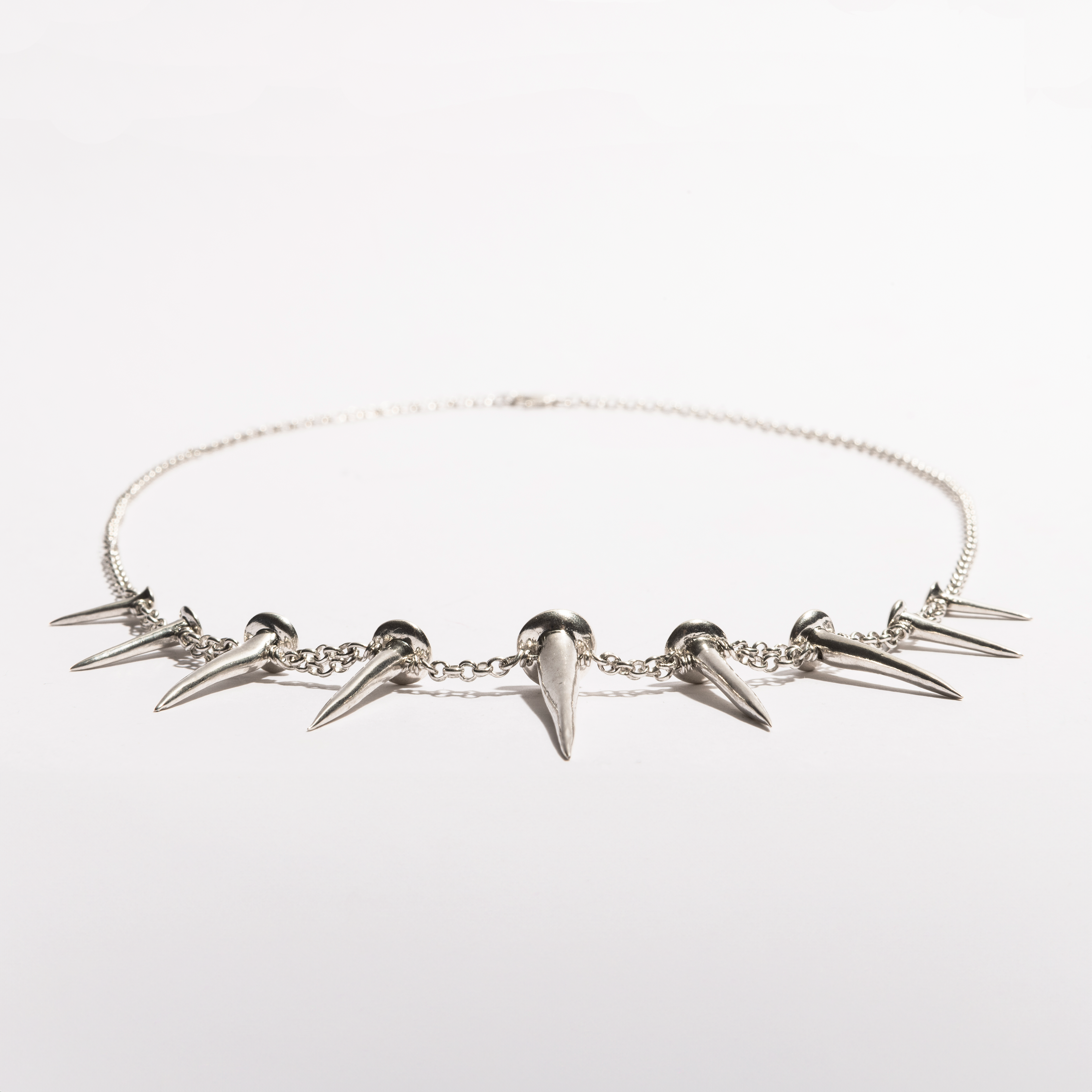 Top view of the Nails Necklace by Sebamakes, handcrafted sterling silver necklace with sculptural nail-inspired spikes and Italian artisanal design.