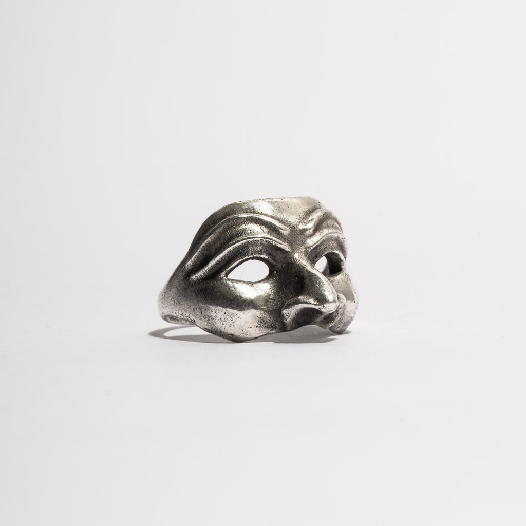 Side view of the Pantalone Ring in sterling silver, handcrafted Venetian mask jewelry by Sebamakes with sculptural gothic form.
