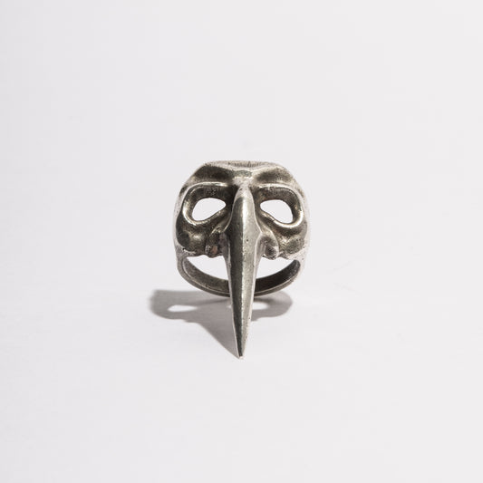 Front view of the Plague Doctor Mask Ring by Sebamakes, handcrafted sterling silver ring inspired by Venetian carnival masks and the plague doctor design, made in Italy. 