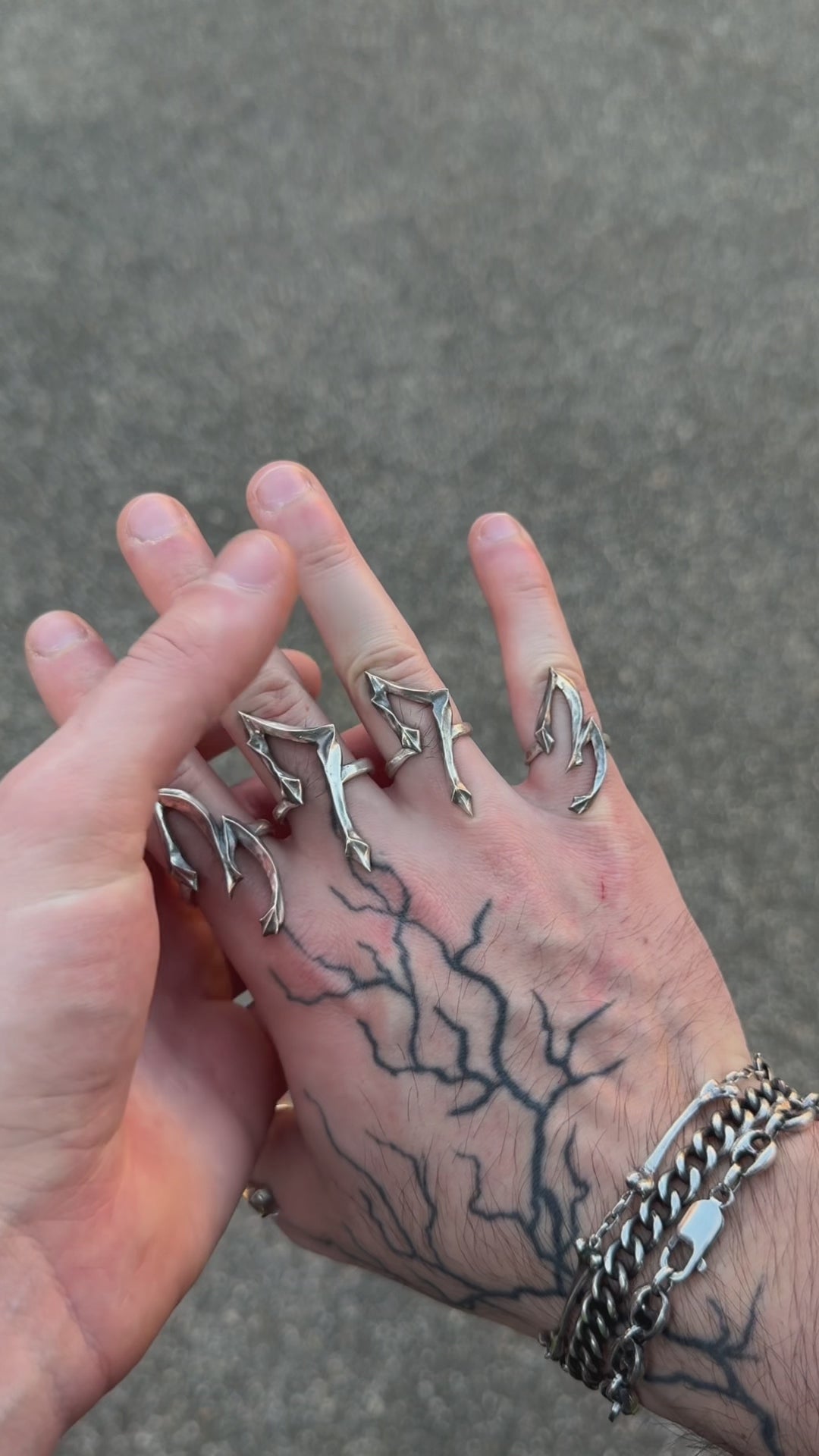 Demonstration video showing hands wearing multiple silver number rings from the Seba Makes 09 Collection, highlighting their details, movement, and real-life proportions.