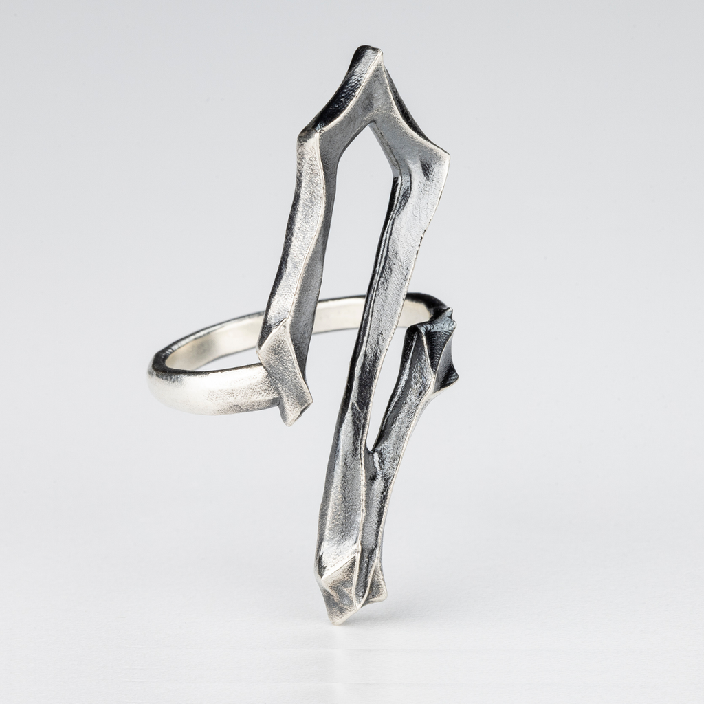 Side view of the 2 Ring showing the sculptural gothic structure in sterling silver.
