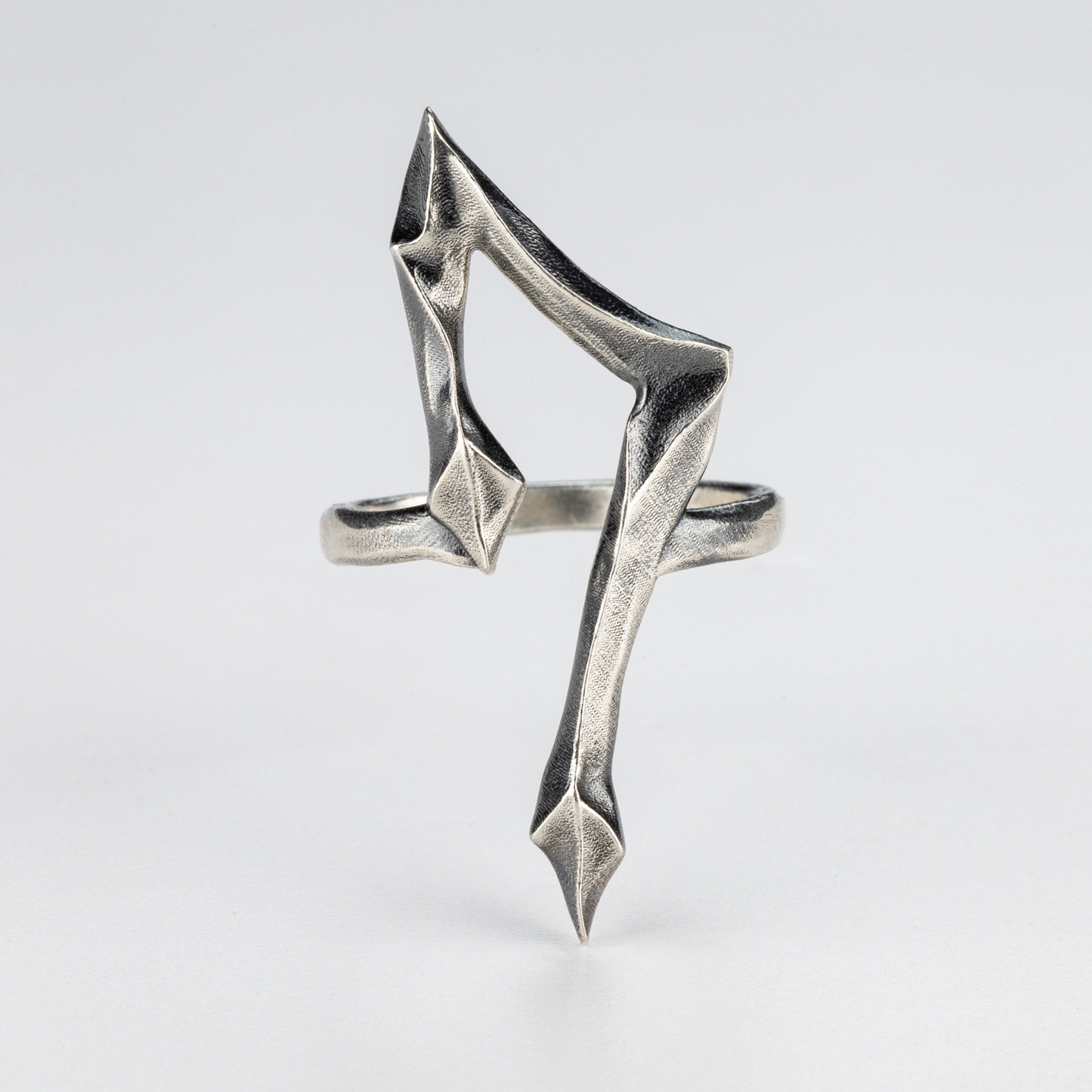 7 Ring by Sebamakes – handcrafted gothic silver ring with sharp sculptural silhouette, front view.