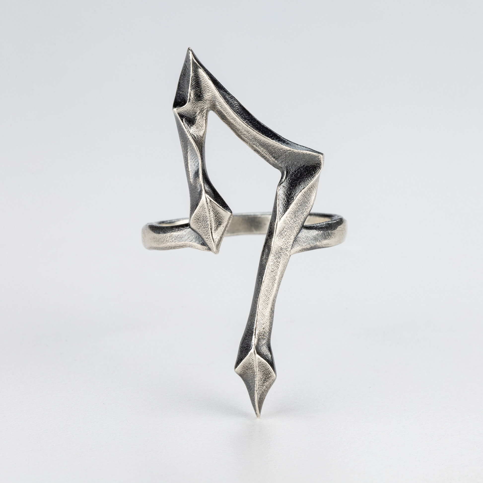 7 Ring by Sebamakes – handcrafted gothic silver ring with sharp sculptural silhouette, front view.