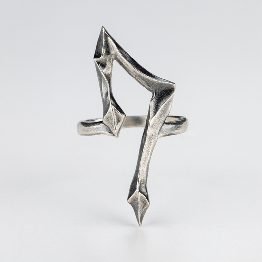 7 Ring by Sebamakes – handcrafted gothic silver ring with sharp sculptural silhouette, front view.