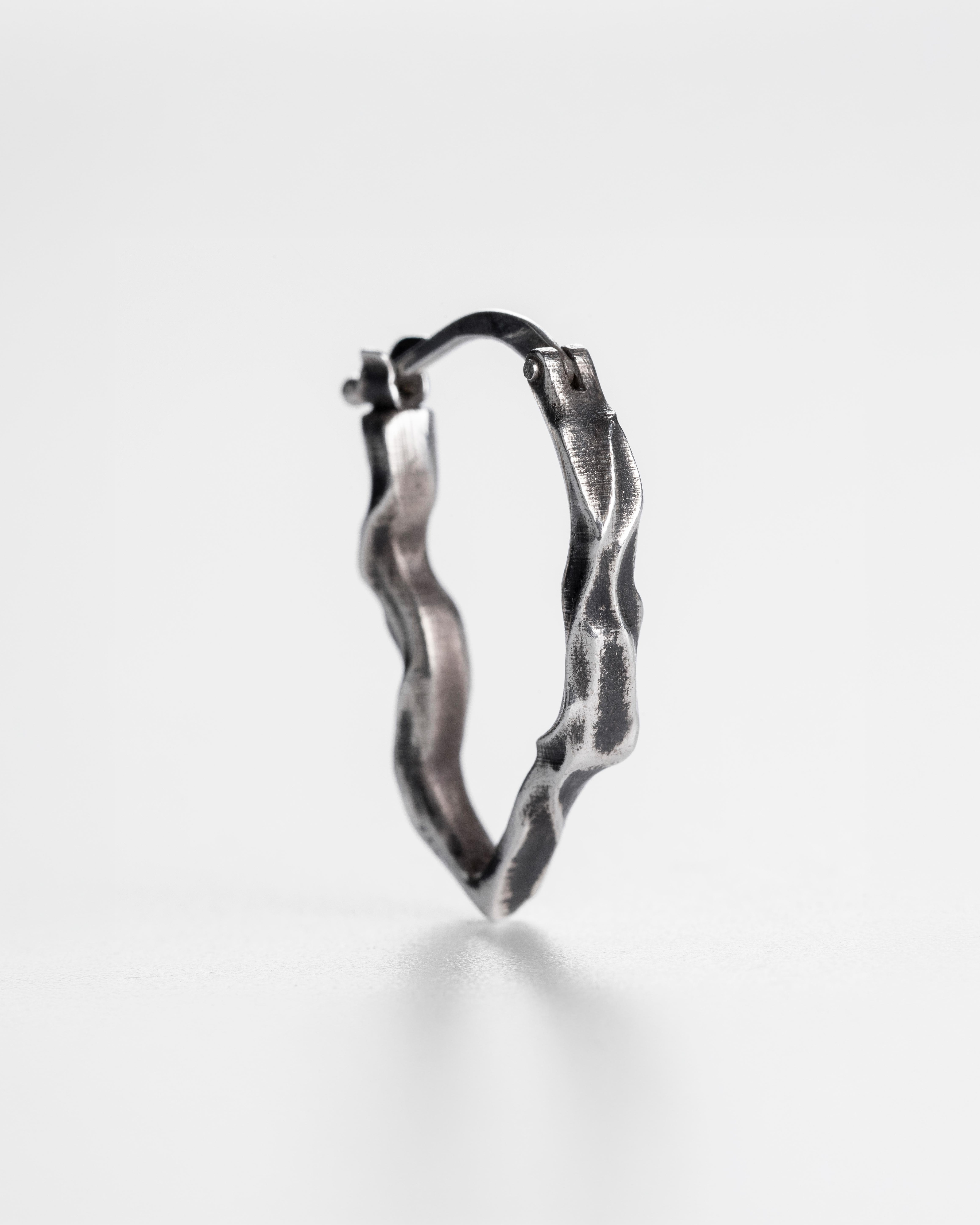 Oxidized 925 sterling silver short Ridge hoop earrings, close-up view of the handmade design.