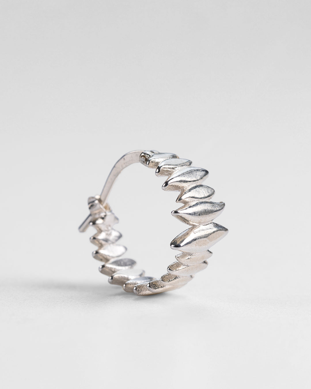 sterling silver Splinters hoop earrings, close-up view of the handmade design.
