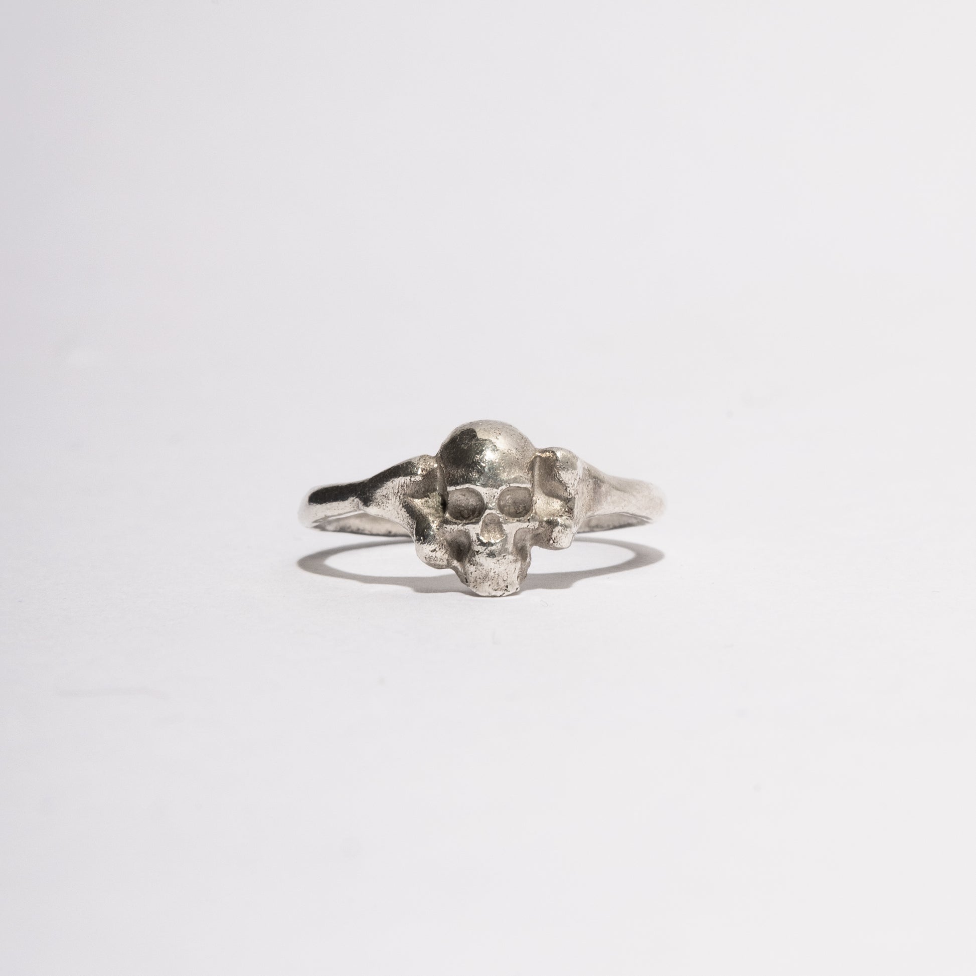Silver Skull Ring by Sebamakes, handcrafted sterling silver gothic ring featuring a sculptural skull design, made in Italy.