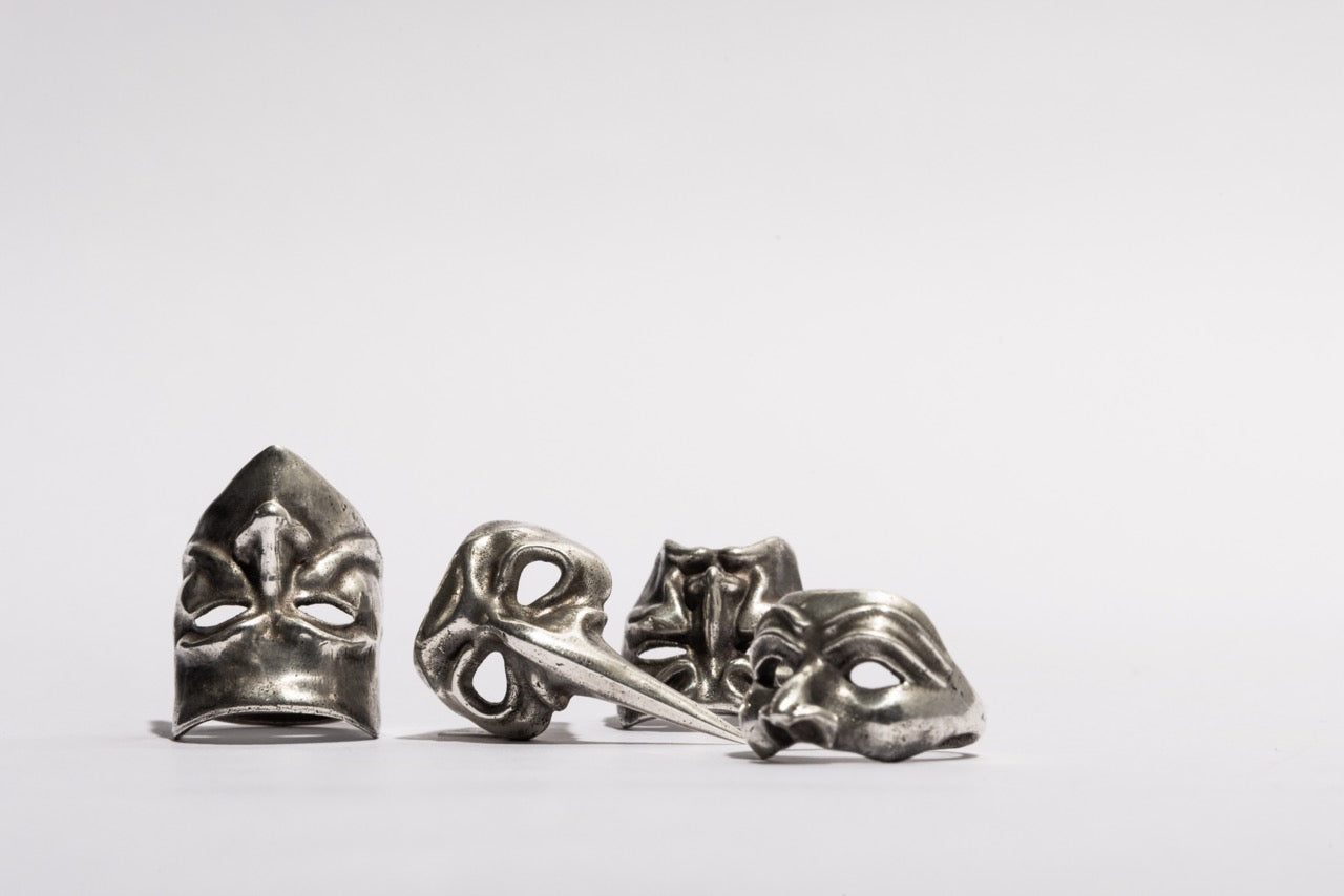 Detail of a Sebamakes Venetian Carnival Mask Ring in sterling silver, showing handcrafted texture and sculptural form inspired by traditional masks.